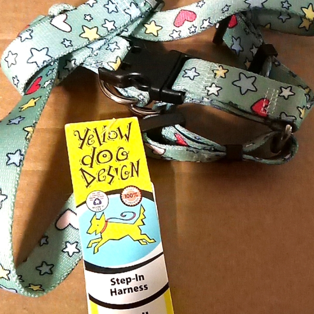 Yellow dog small step in dog harness green star